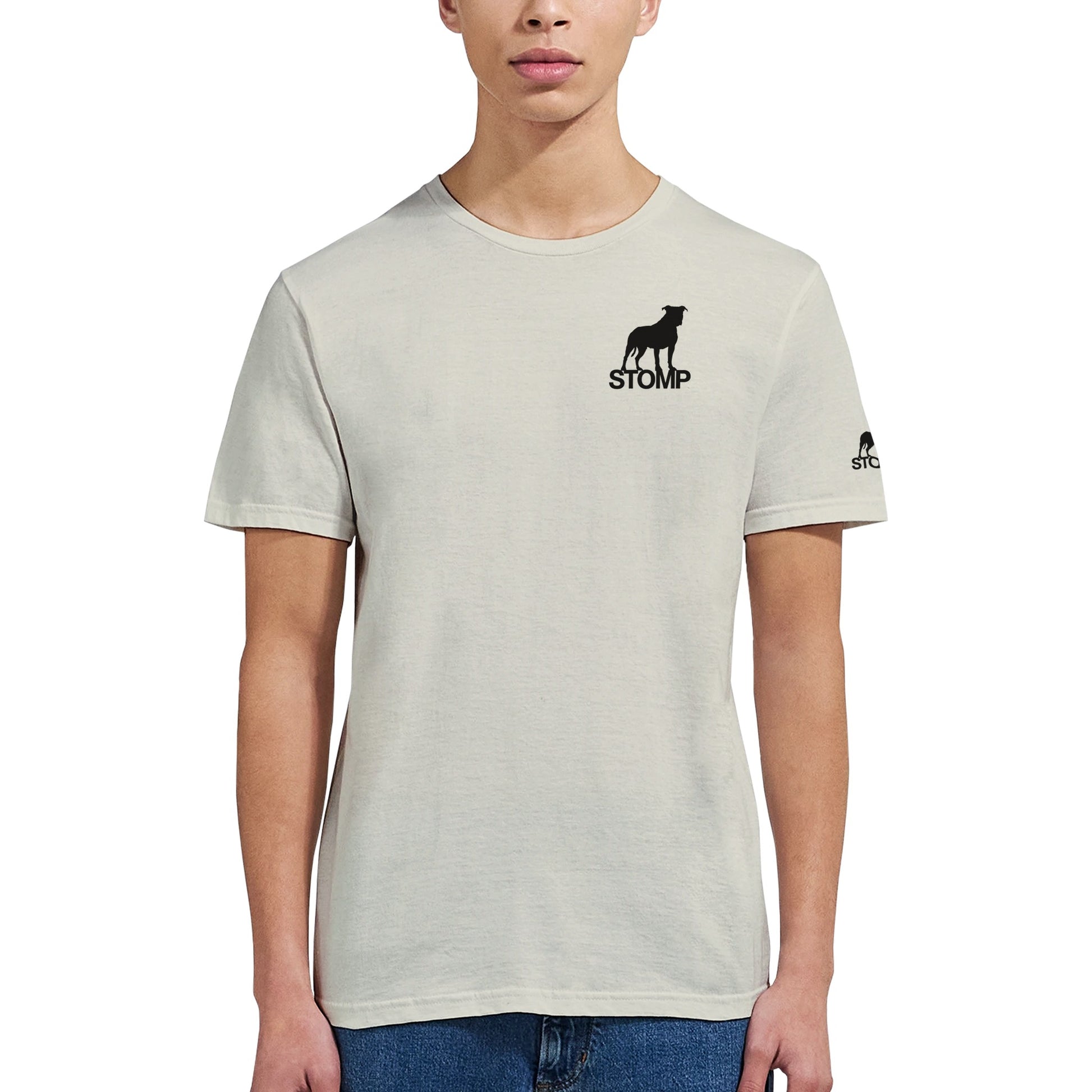 Person wearing a light gray t-shirt with 'STOMP' logo on a white background