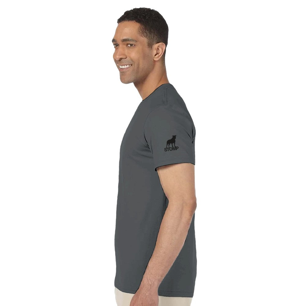 Man wearing a gray t-shirt with a logo on the sleeve against a white background