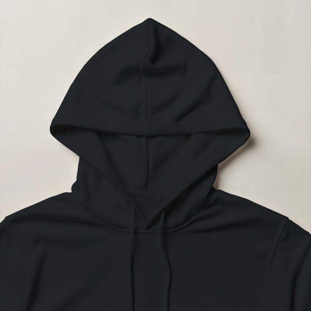 Black hoodie on a light beige background