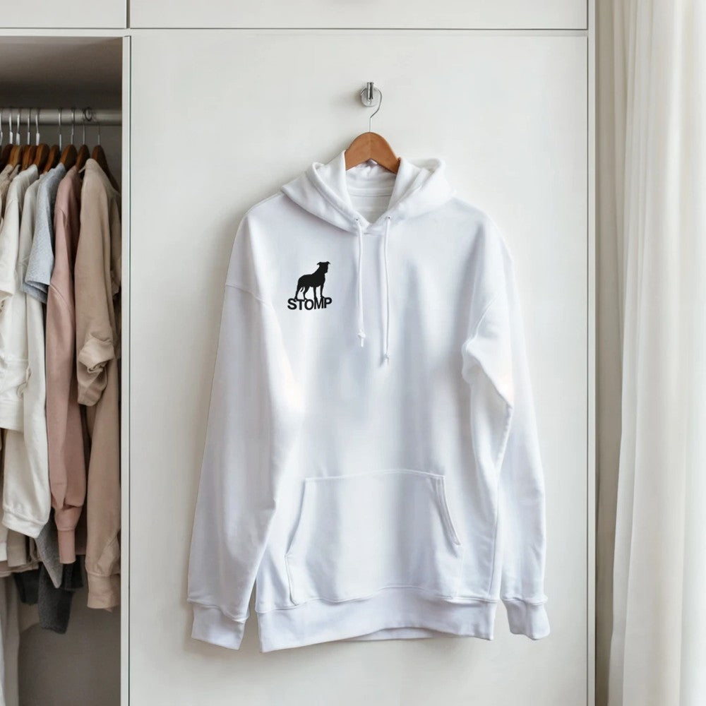 White hoodie with a logo hanging on a wooden hanger against a white wardrobe background. Drum and bass