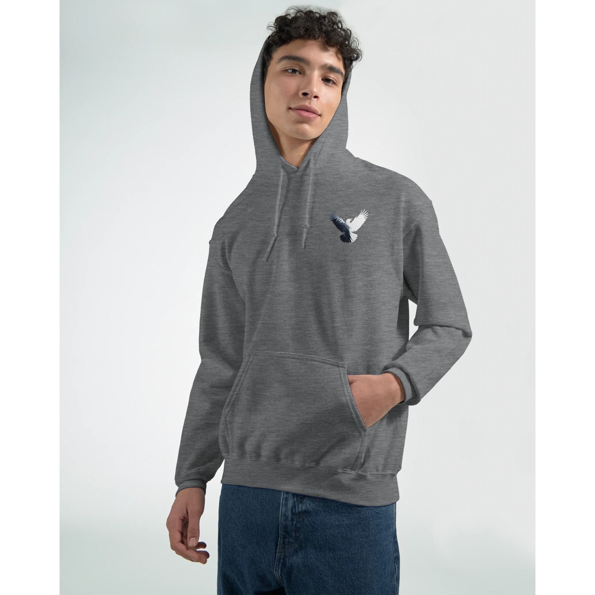 Person wearing a gray hoodie with a logo on a white background