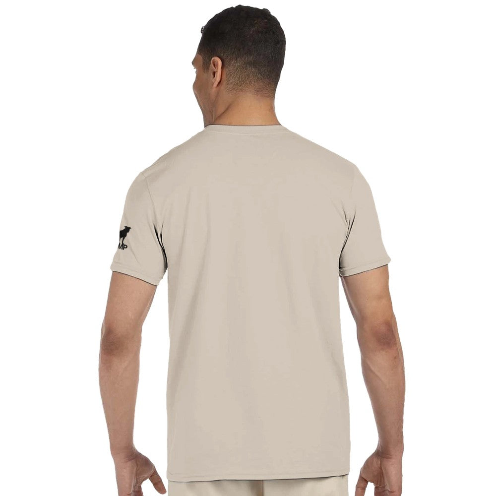 Man wearing a beige t-shirt with a small logo on the sleeve against a white background